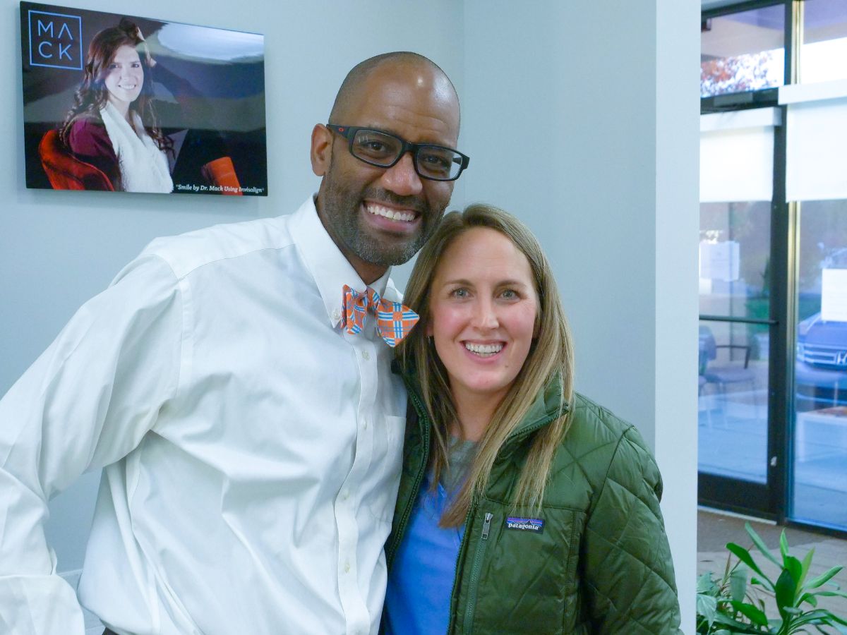 Patient smiling after getting Greensboro braces treatment at Mack Orthodontics