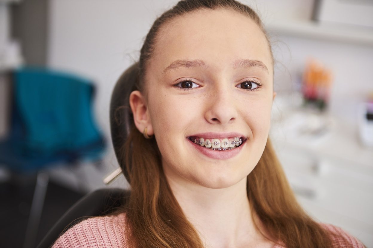 Smiling girl with braces