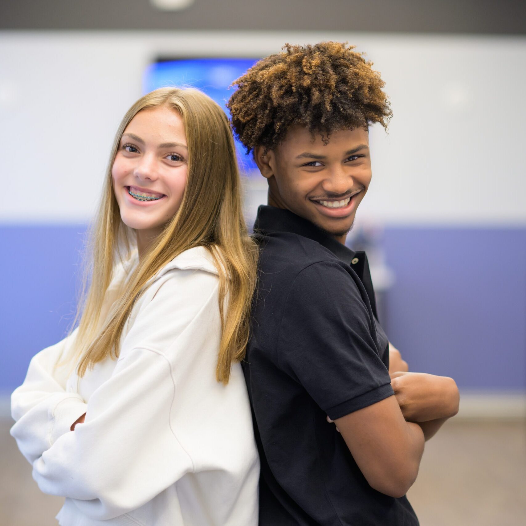 orthodontics burlington nc patients standing back to back